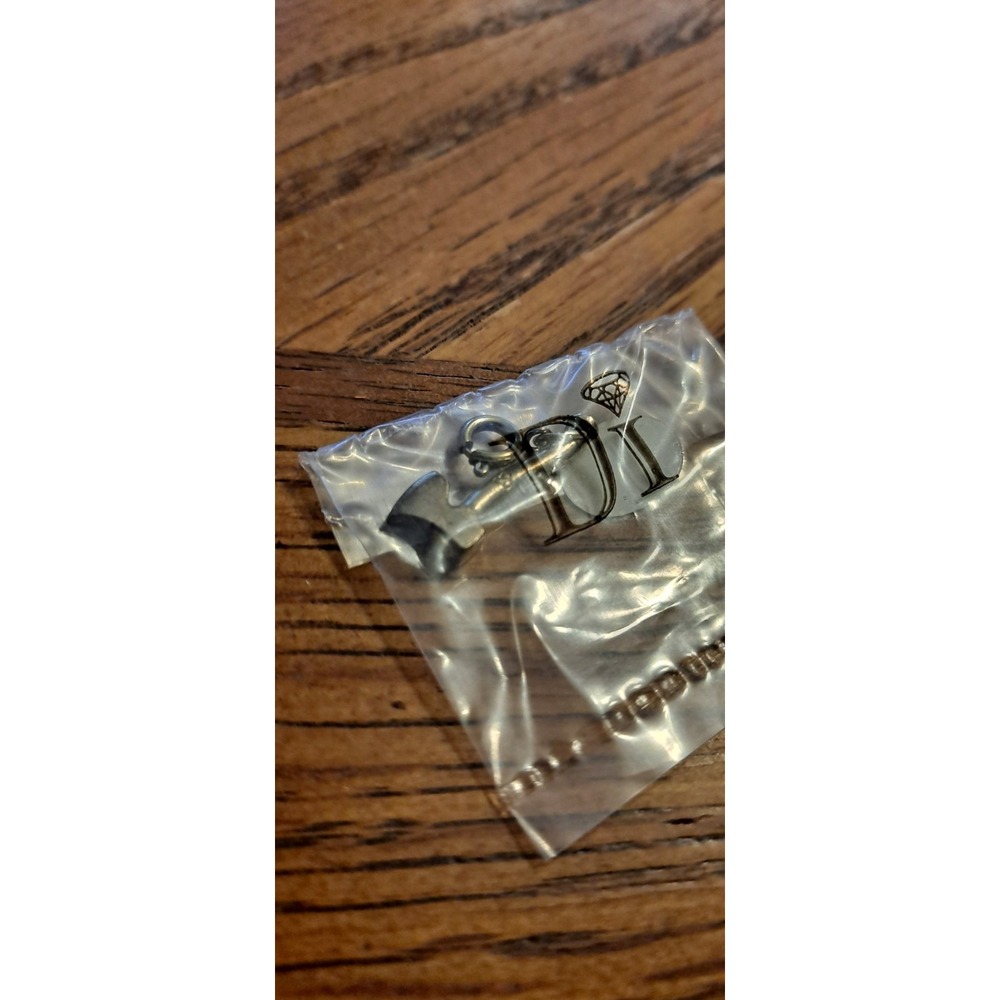 gold-tone axe charm from‎ the Diamonds International